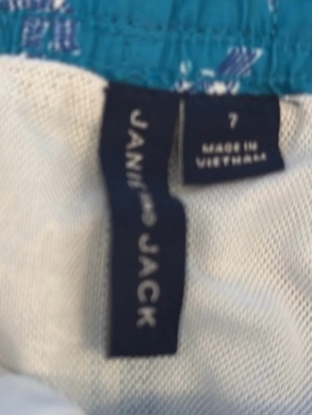 Janie and Jack Teal World Love Swim Trunks with Animal Print